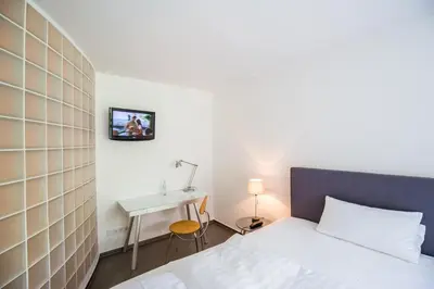 Ein Bett oder Betten in einem Zimmer der Unterkunft Wald & Golfhotel Lottental