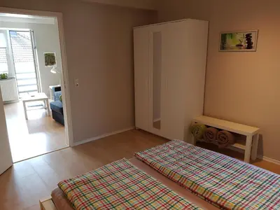 Ein Bett oder Betten in einem Zimmer der Unterkunft Haus Homann-Schneider, Wohnung Wetter