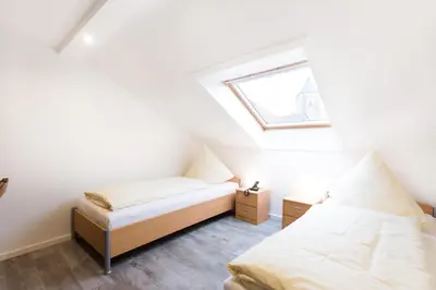 Ein Bett oder Betten in einem Zimmer der Unterkunft Hotel Rave