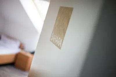 Ein Bett oder Betten in einem Zimmer der Unterkunft Hotel Rave
