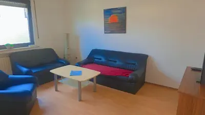 Ein Sitzbereich in der Unterkunft Johnny's wohnen auf Zeit