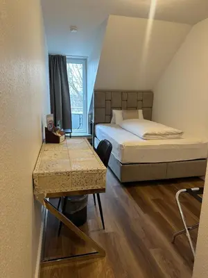 Ein Bett oder Betten in einem Zimmer der Unterkunft Hotel Unterfeldhaus