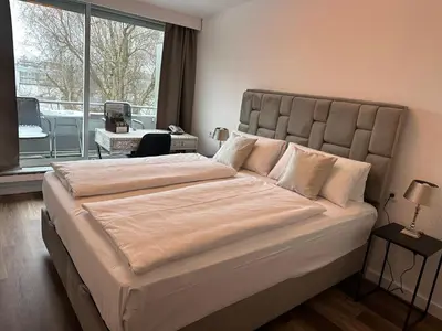 Ein Bett oder Betten in einem Zimmer der Unterkunft Hotel Unterfeldhaus