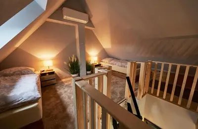 Ein Bett oder Betten in einem Zimmer der Unterkunft Wagyu Farm Hof Holtmann