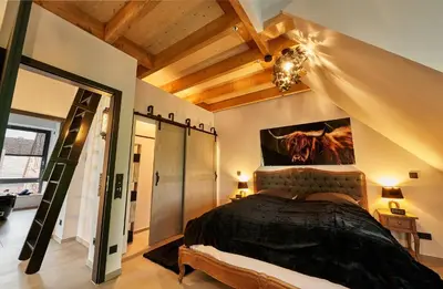 Ein Bett oder Betten in einem Zimmer der Unterkunft Wagyu Farm Hof Holtmann