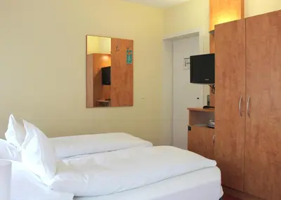 Ein Bett oder Betten in einem Zimmer der Unterkunft Hotel Ostmeier