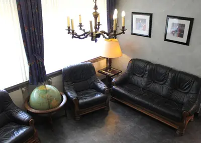 Ein Sitzbereich in der Unterkunft Hotel Ostmeier
