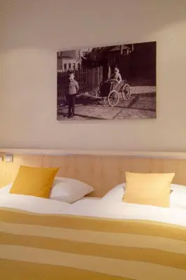 Ein Bett oder Betten in einem Zimmer der Unterkunft Gästehaus Rohleder