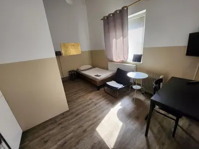 TV/Unterhaltungsangebot in der Unterkunft Studio-Apartments & möblierte Wohnungen für Monteure zentral in Mülheim an der Ruhr