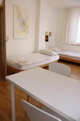 Ein Bett oder Betten in einem Zimmer der Unterkunft Studio-Apartments & möblierte Wohnungen für Monteure zentral in Mülheim an der Ruhr