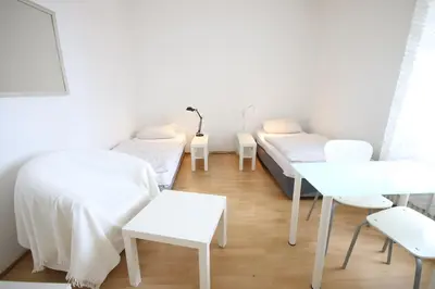 Ein Bett oder Betten in einem Zimmer der Unterkunft Moderne Studio Apartments und 120qm Wohnungen in Oberhausen, ideal für Geschäftsreisende und Monteure