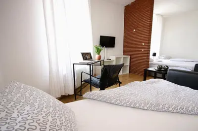 Ein Bett oder Betten in einem Zimmer der Unterkunft Moderne Studio Apartments und 120qm Wohnungen in Oberhausen, ideal für Geschäftsreisende und Monteure