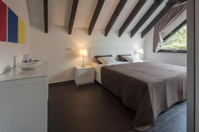 Ein Bett oder Betten in einem Zimmer der Unterkunft WK - Suite