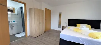 Ein Bett oder Betten in einem Zimmer der Unterkunft Steakhaus Galgenbach