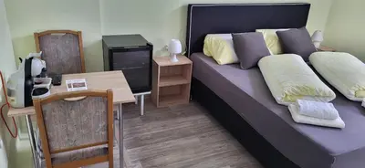 Ein Bett oder Betten in einem Zimmer der Unterkunft Steakhaus Galgenbach