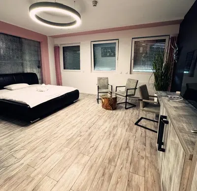 Ein Bett oder Betten in einem Zimmer der Unterkunft VitaLounge Sports & Spa Hotel