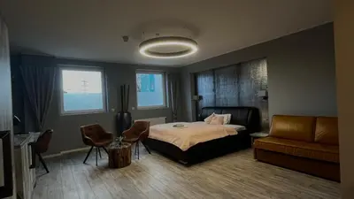 Ein Bett oder Betten in einem Zimmer der Unterkunft VitaLounge Sports & Spa Hotel