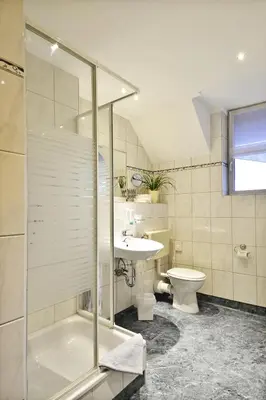 Ein Badezimmer in der Unterkunft Hotel Haus Kleimann-Reuer
