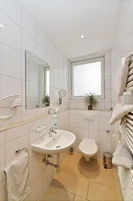 Ein Badezimmer in der Unterkunft Hotel Haus Kleimann-Reuer