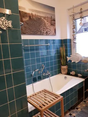 Ein Badezimmer in der Unterkunft FewoFaubelCentro 42 & 54 & 62 m2