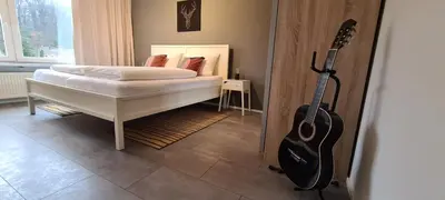 Ein Bett oder Betten in einem Zimmer der Unterkunft 1Step2AllCities House&Garden