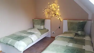 Ein Bett oder Betten in einem Zimmer der Unterkunft Ferienwohnung Kirchhellen 