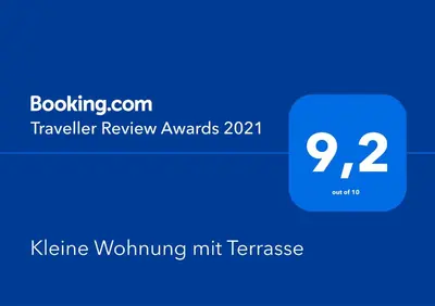 Ein Zertifikat, Auszeichnung, Logo oder anderes Dokument, das in der Unterkunft Kleine Wohnung mit Terrasse ausgestellt ist