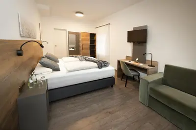 Ein Bett oder Betten in einem Zimmer der Unterkunft Zur Alten Post