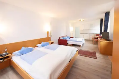 Ein Bett oder Betten in einem Zimmer der Unterkunft Zur Alten Post
