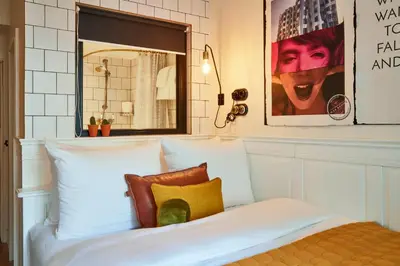 Ein Bett oder Betten in einem Zimmer der Unterkunft Max Brown Hotel Midtown, part of Sircle Collection