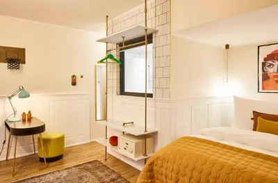 Ein Bett oder Betten in einem Zimmer der Unterkunft Max Brown Hotel Midtown, part of Sircle Collection