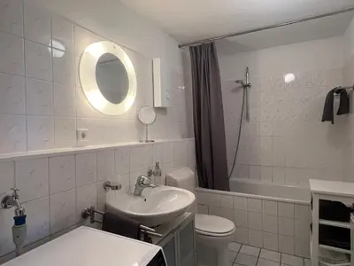 Ein Badezimmer in der Unterkunft City-Apartment