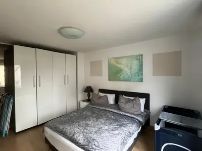 Ein Bett oder Betten in einem Zimmer der Unterkunft Gemütlich