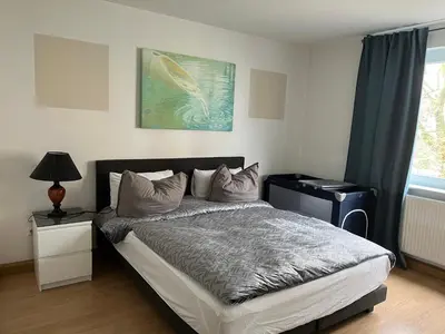 Ein Bett oder Betten in einem Zimmer der Unterkunft Gemütlich