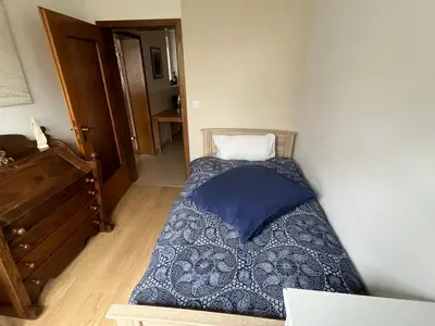 Ein Bett oder Betten in einem Zimmer der Unterkunft Gemütlich