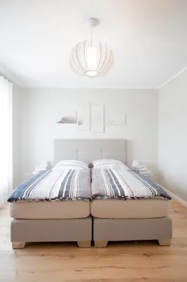 Ein Bett oder Betten in einem Zimmer der Unterkunft Penthouse M