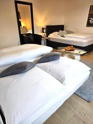 Ein Bett oder Betten in einem Zimmer der Unterkunft My Sweet Home City