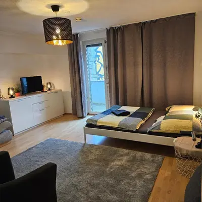Ein Bett oder Betten in einem Zimmer der Unterkunft My Sweet Apartment Ferien & Messe Wohnung Düsseldorf re