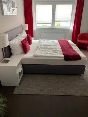 Ein Bett oder Betten in einem Zimmer der Unterkunft Hotel zum Postwagen