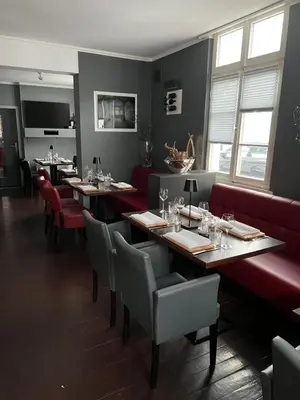 Ein Sitzbereich in der Unterkunft Hotel zum Postwagen