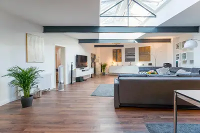 Ein Sitzbereich in der Unterkunft White Lofty und White Studio