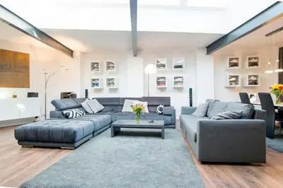 Ein Sitzbereich in der Unterkunft White Lofty und White Studio
