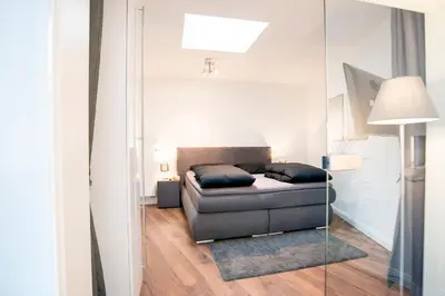 Ein Sitzbereich in der Unterkunft White Lofty und White Studio
