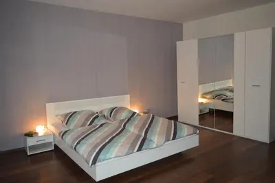 Ein Bett oder Betten in einem Zimmer der Unterkunft Ferienwohnung 