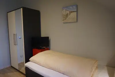 Ein Bett oder Betten in einem Zimmer der Unterkunft Hotel-Restaurant Große-Wilde
