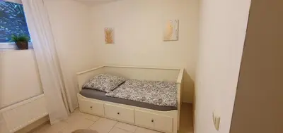 Ein Bett oder Betten in einem Zimmer der Unterkunft Ferienwohnung auf dem Land Schermbeck Moviepark