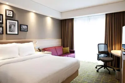 Ein Bett oder Betten in einem Zimmer der Unterkunft Hampton By Hilton Dortmund Phoenix See