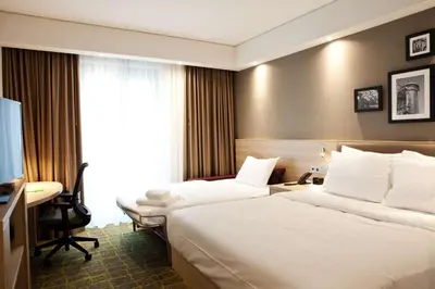 Ein Bett oder Betten in einem Zimmer der Unterkunft Hampton By Hilton Dortmund Phoenix See
