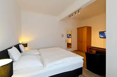 Ein Bett oder Betten in einem Zimmer der Unterkunft Hotel Jammerkrug