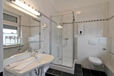 Ein Badezimmer in der Unterkunft Hotel Jammerkrug